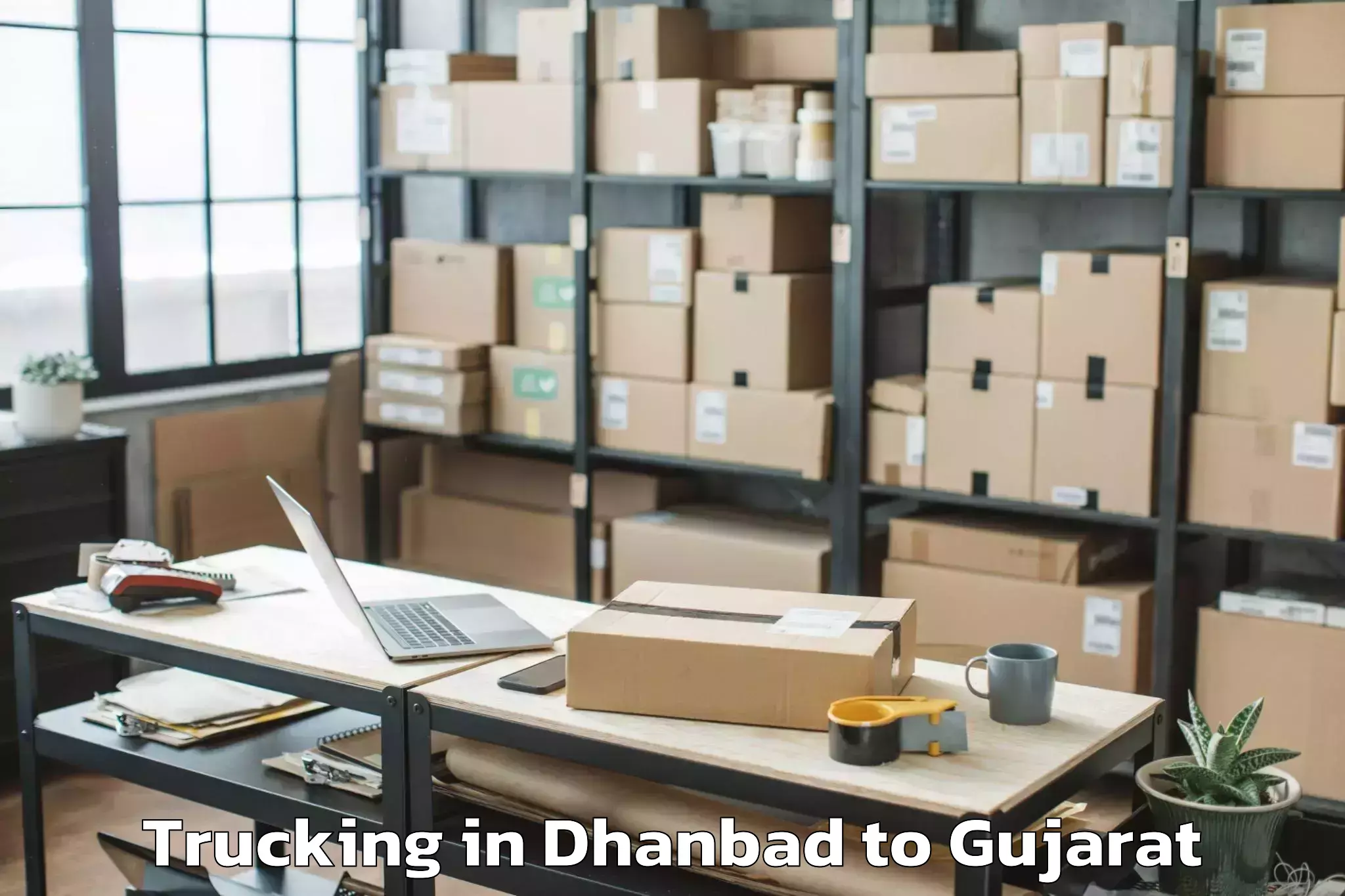 Get Dhanbad to Navrachana University Vadodara Trucking